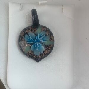 Glass Pendant with Blue Floral Design